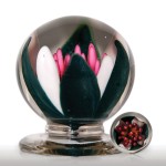 Lot 68 Very rare antique Millville pink water lily pedestal paperweight. “This rare weight is one of the most dramatic of all paperweights.” -- “The Dictionary of Glass Paperweights”.