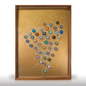 Lot 329 Forty-two paperweight buttons, mounted as a grape cluster and framed